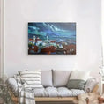Cargar la imagen en la vista de la galería, Framed canvas art of San Roque rooftops with cats, hanging above a modern sofa in a living room.