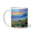 Bild in Galerie-Betrachter laden, White mug featuring colorful landscape art of Guadalquitón Natural Reserve coastline