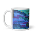 Load image into Gallery viewer, White ceramic mug with colorful, abstract cloud and nature artwork design