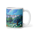 Load image into Gallery viewer, Ceramic mug with colorful painting of a village, trees, and grazing sheep landscape.