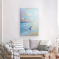 Charger l'image dans la visionneuse de la galerie, Surf art canvas of girl with surfboard on beach, hanging above modern sofa in bright living room