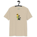 Загрузить изображение в просмотрщик галереи, Beige unisex organic cotton t-shirt with cartoon cat and surfboard graphic on hanger