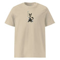 Charger l'image dans la visionneuse de la galerie, Unisex organic cotton t-shirt in desert dust color with abstract black cat graphic on front