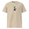 Carregar imagem no visualizador da Galeria, Unisex organic cotton t-shirt in desert dust color with abstract black cat graphic on front