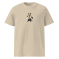Cargar la imagen en la vista de la galería, Unisex organic cotton t-shirt in desert dust color with cartoon cat graphic on front