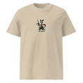 Carregar imagem no visualizador da Galeria, Unisex organic cotton t-shirt desert dust color with cartoon cat holding rifle and 'Kitty Revolution' text