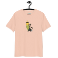 Load image into Gallery viewer, Unisex organic cotton t-shirt in peach with cartoon cat and surfboard graphic on front