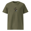 Carregar imagem no visualizador da Galeria, Khaki unisex organic cotton t-shirt with cartoon cat holding rifle and 'Kitty Revolution' text