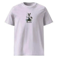 Cargar la imagen en la vista de la galería, Lavender unisex organic cotton t-shirt with cartoon cat and fish print, text 'Fishy Business'.