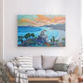 Charger l'image dans la visionneuse de la galerie, Colorful ocean landscape canvas art with rocks, trees, and sunset above a beige sofa