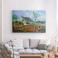 Charger l'image dans la visionneuse de la galerie, Colorful landscape painting with cottage and mountains above a gray sofa in modern living room.